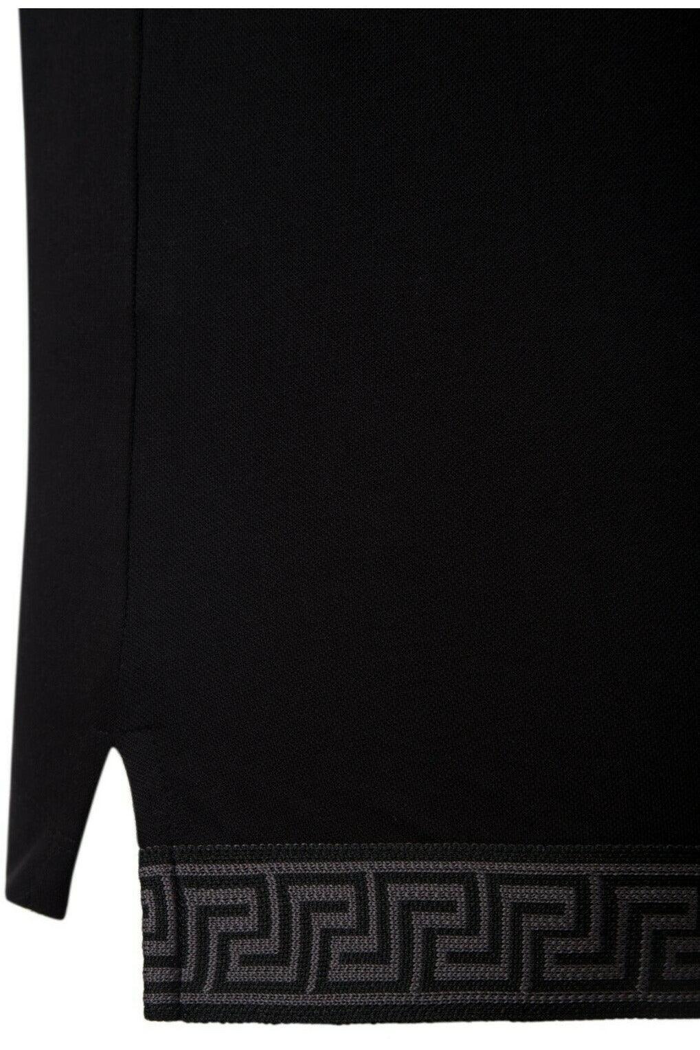 Black fabric with side slit and grey geometric pattern knit trim at the hem
