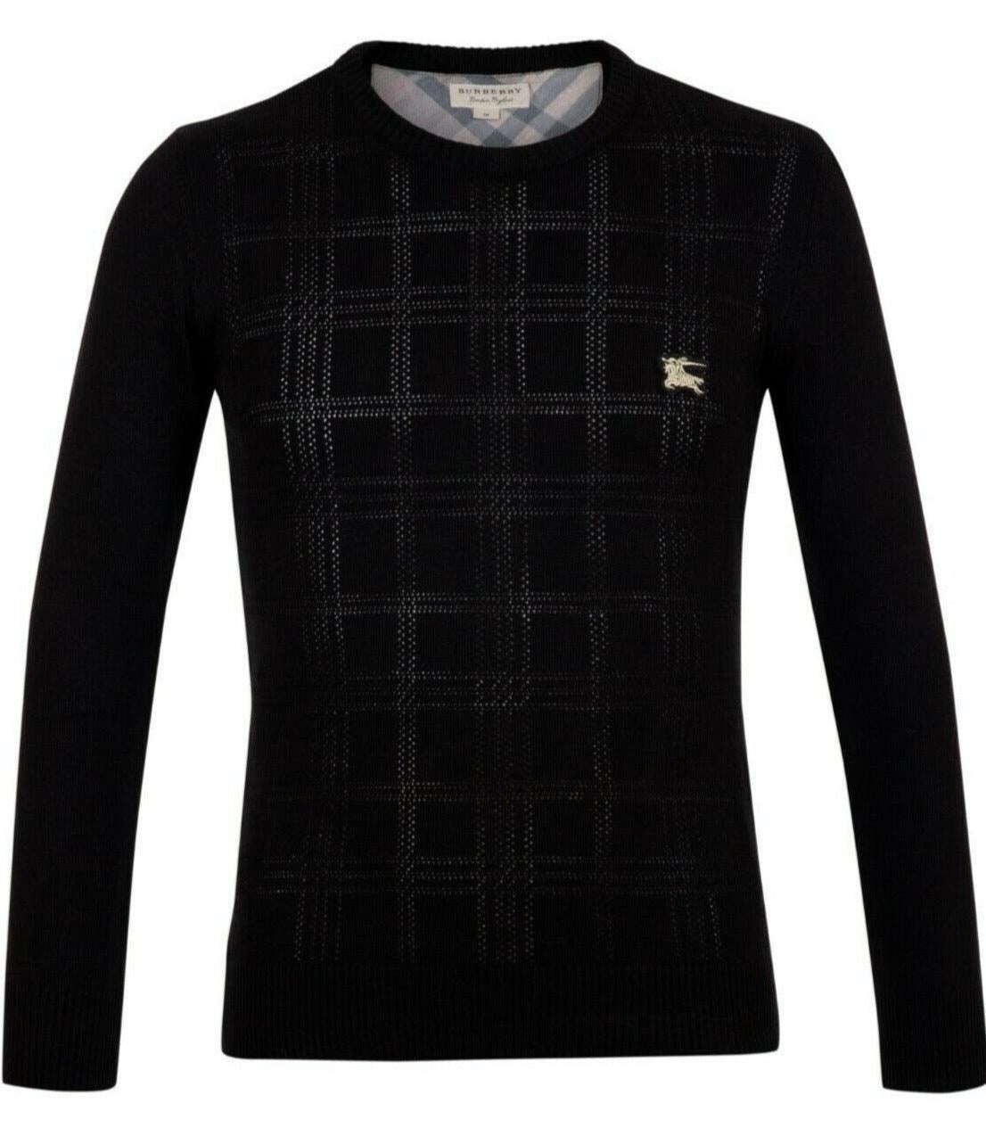 Black Burberry men's long-sleeve sweater with subtle plaid pattern and logo emblem on chest